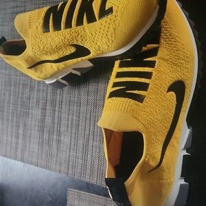 Nike Women's Yellow Slip-On Sneakers